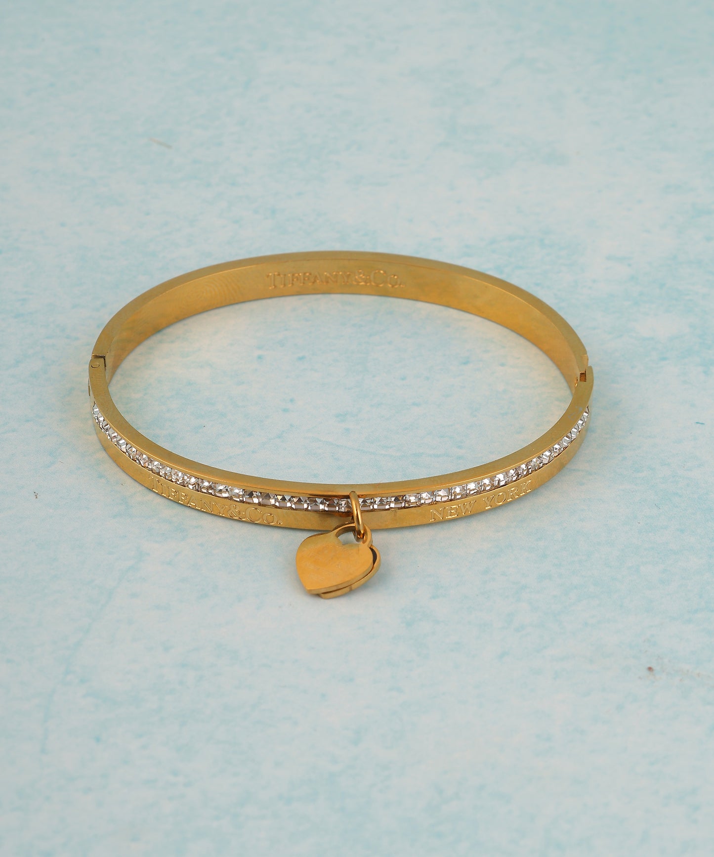 Gold Plated Heart Charm And Crystal Studded Bracelet