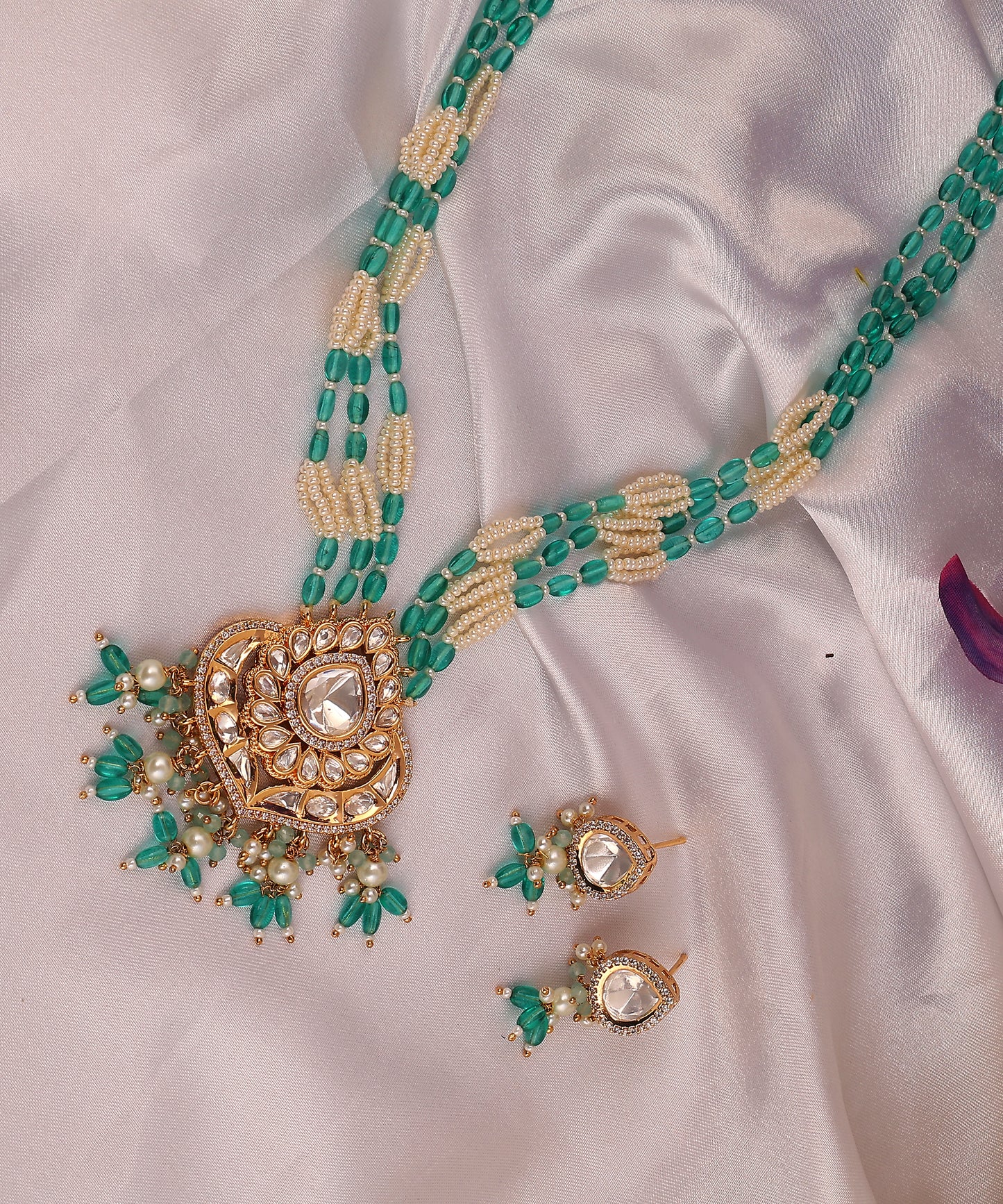 Chandrika Long Necklace Featuring Polki Pendant And Sea Green And White Stone Beaded Strings