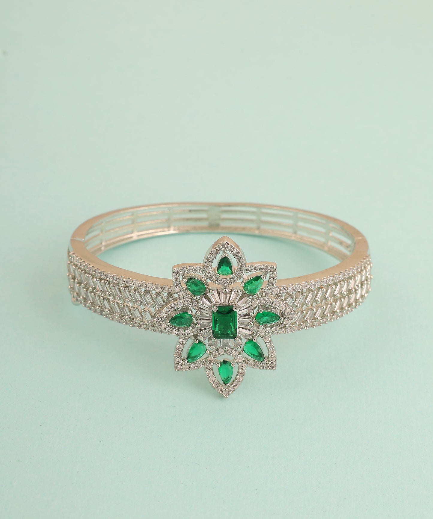 Emerald Studded Flower Shaped Artificial Diamond Bracelet