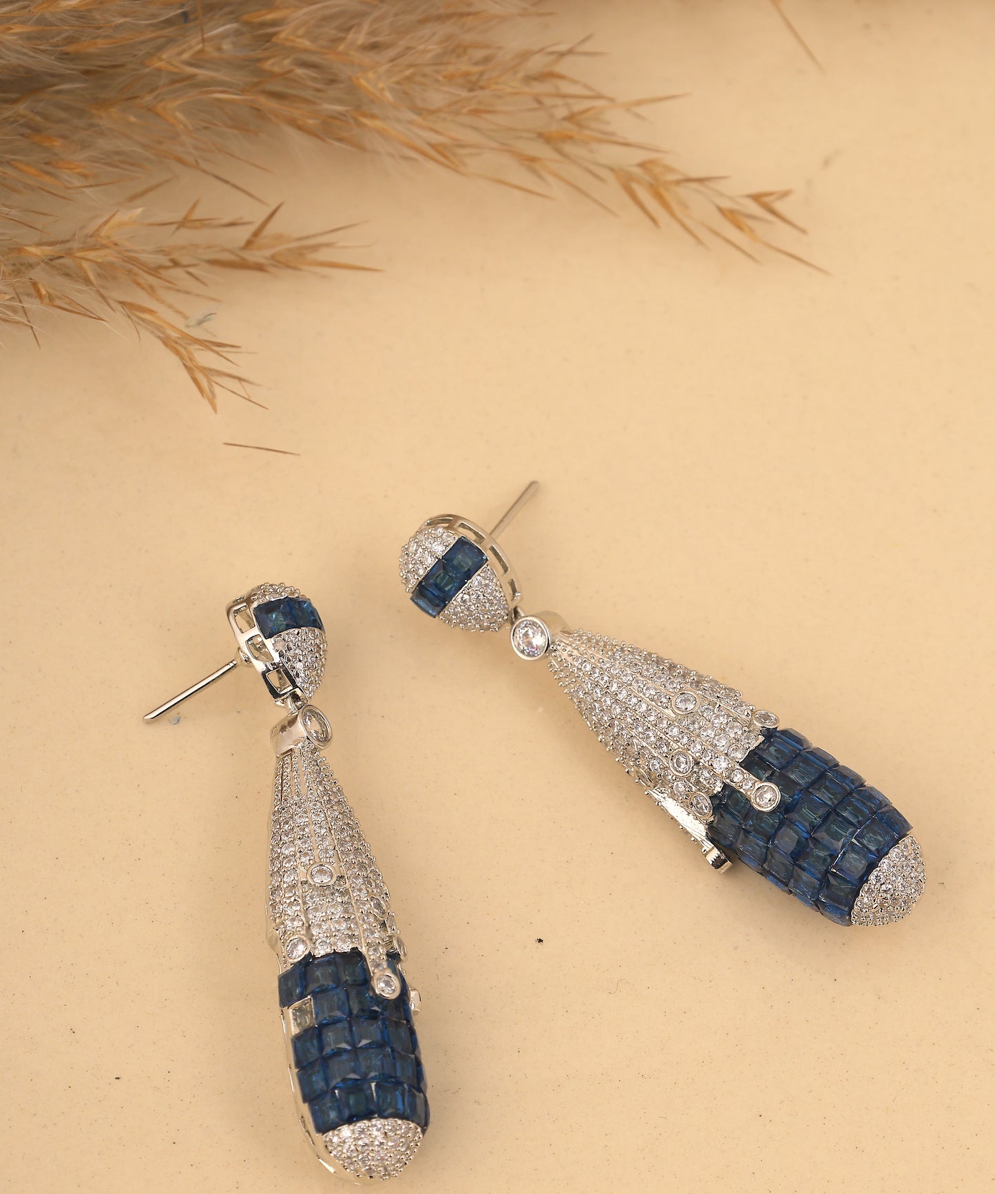 Nano Stones Studded Silver And Blue Artificial Diamond Earrings