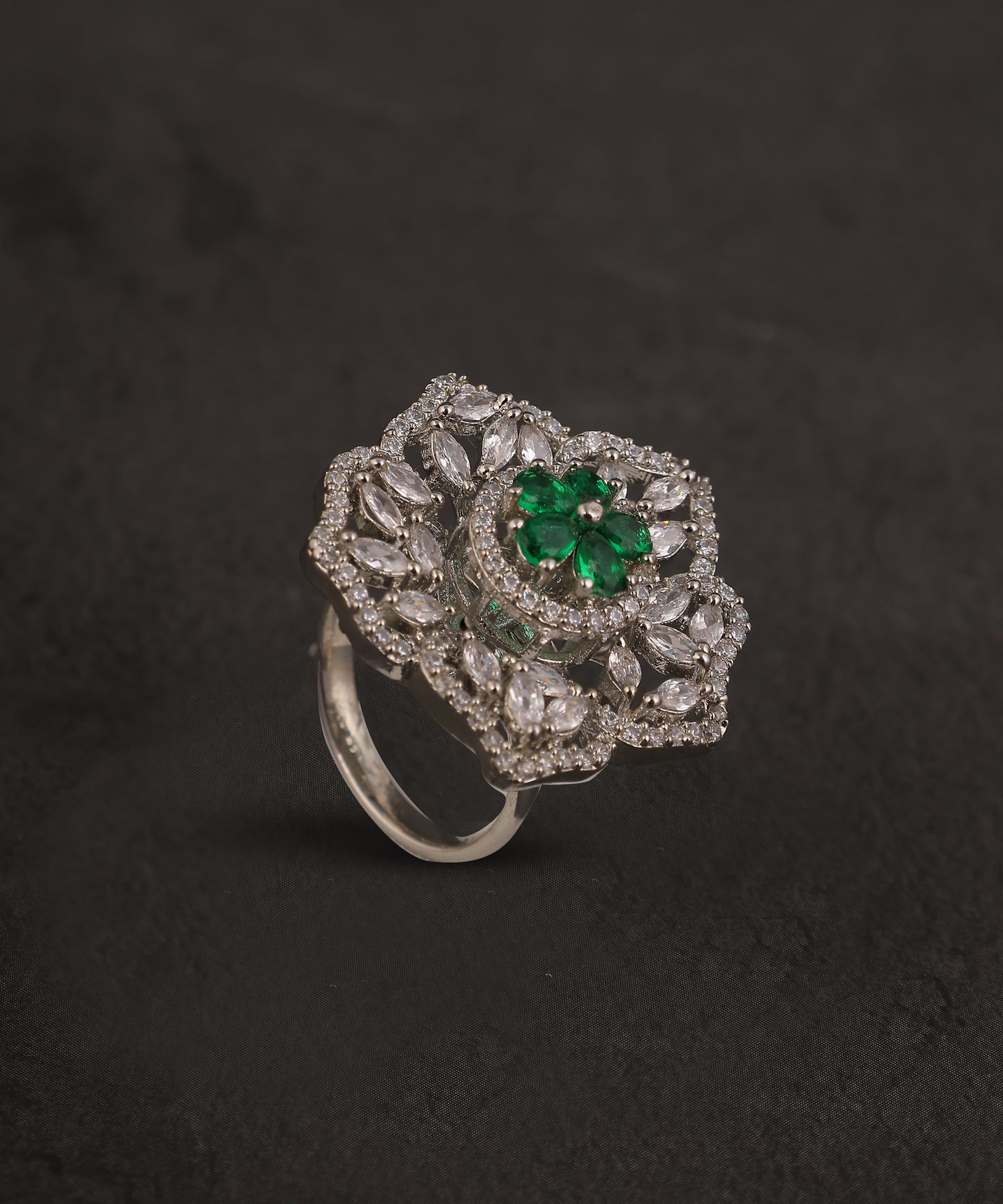 Flower Shaped Crystal And Emerald Stone Studded Artificial Diamond Ring