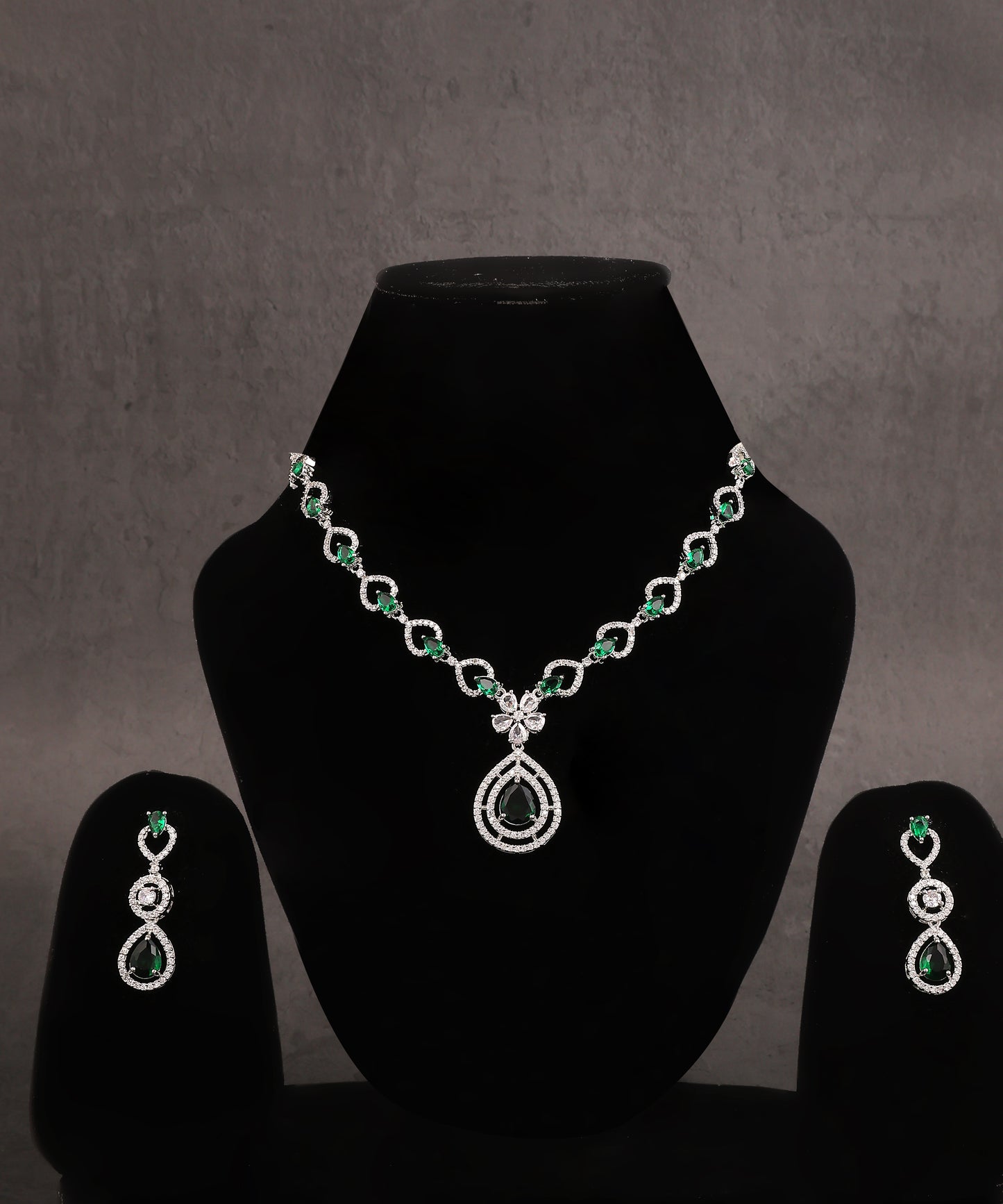Leaf Patterned Emerald Studded Artificial Diamond Necklace