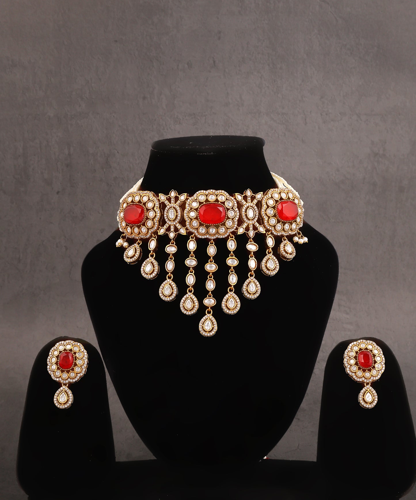 Jharna Necklace Featuring Polki Drops And Red Doublet Stone