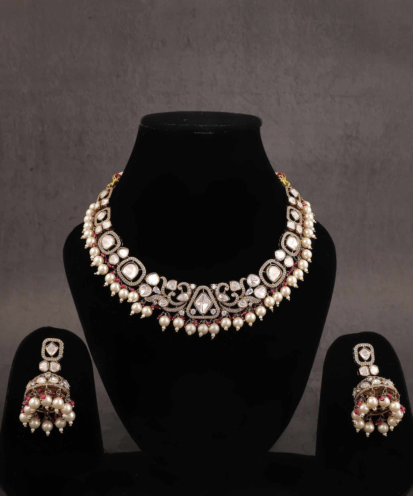 Rysa Necklace With Jhumkas Featuring Polkis, Pearl And Ruby Beads