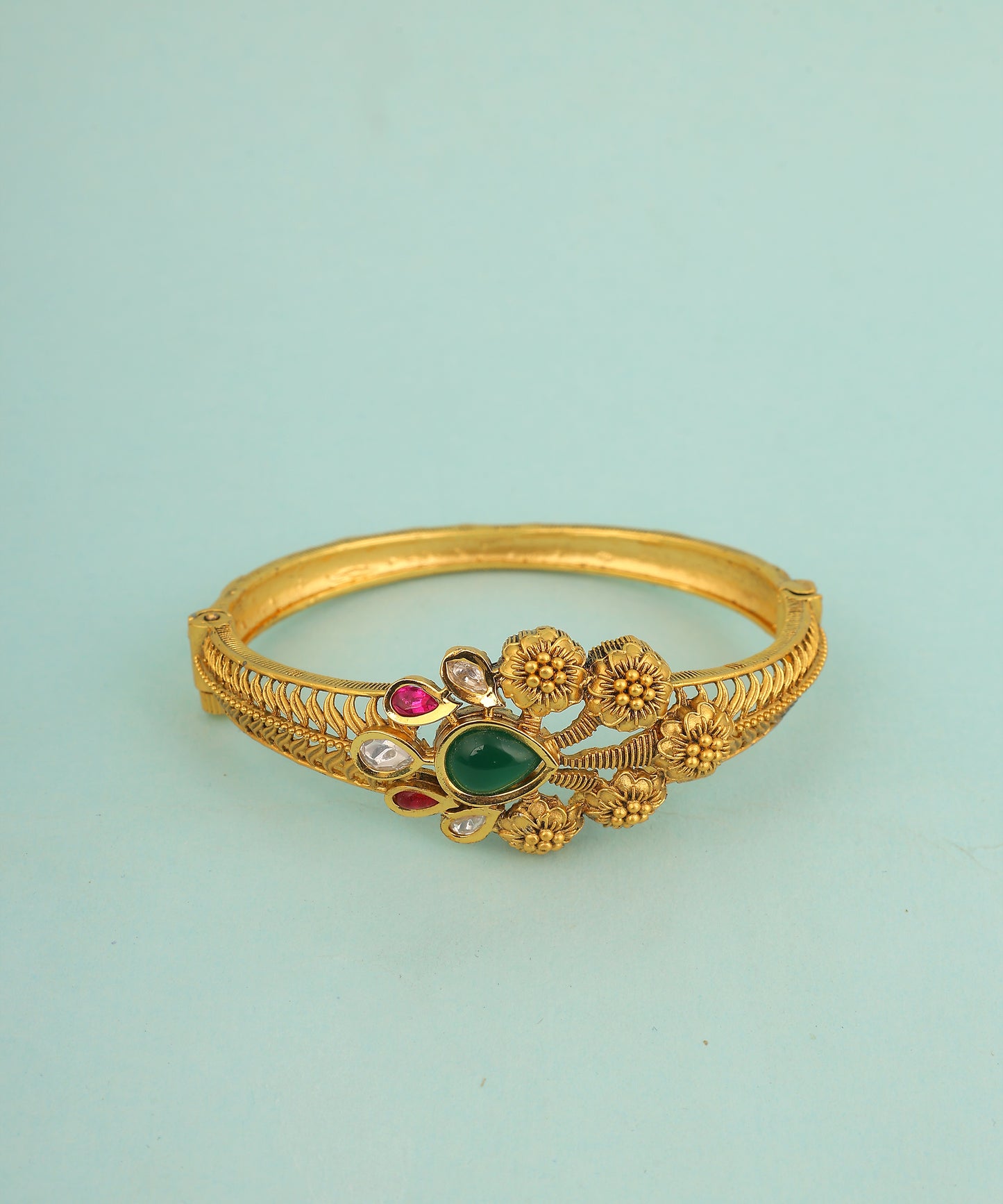 Peacock Inspired Gold Toned Bracelet With Emerald And Ruby Stones