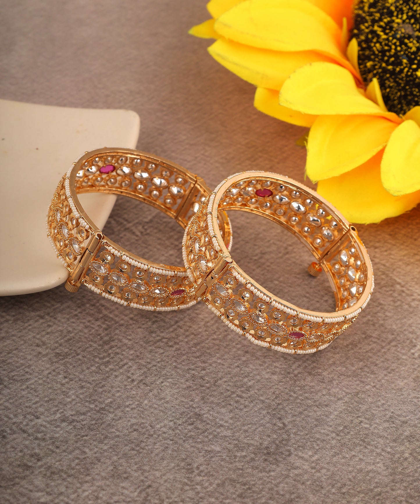 Polki Ruby Studded Gold Toned Bangles