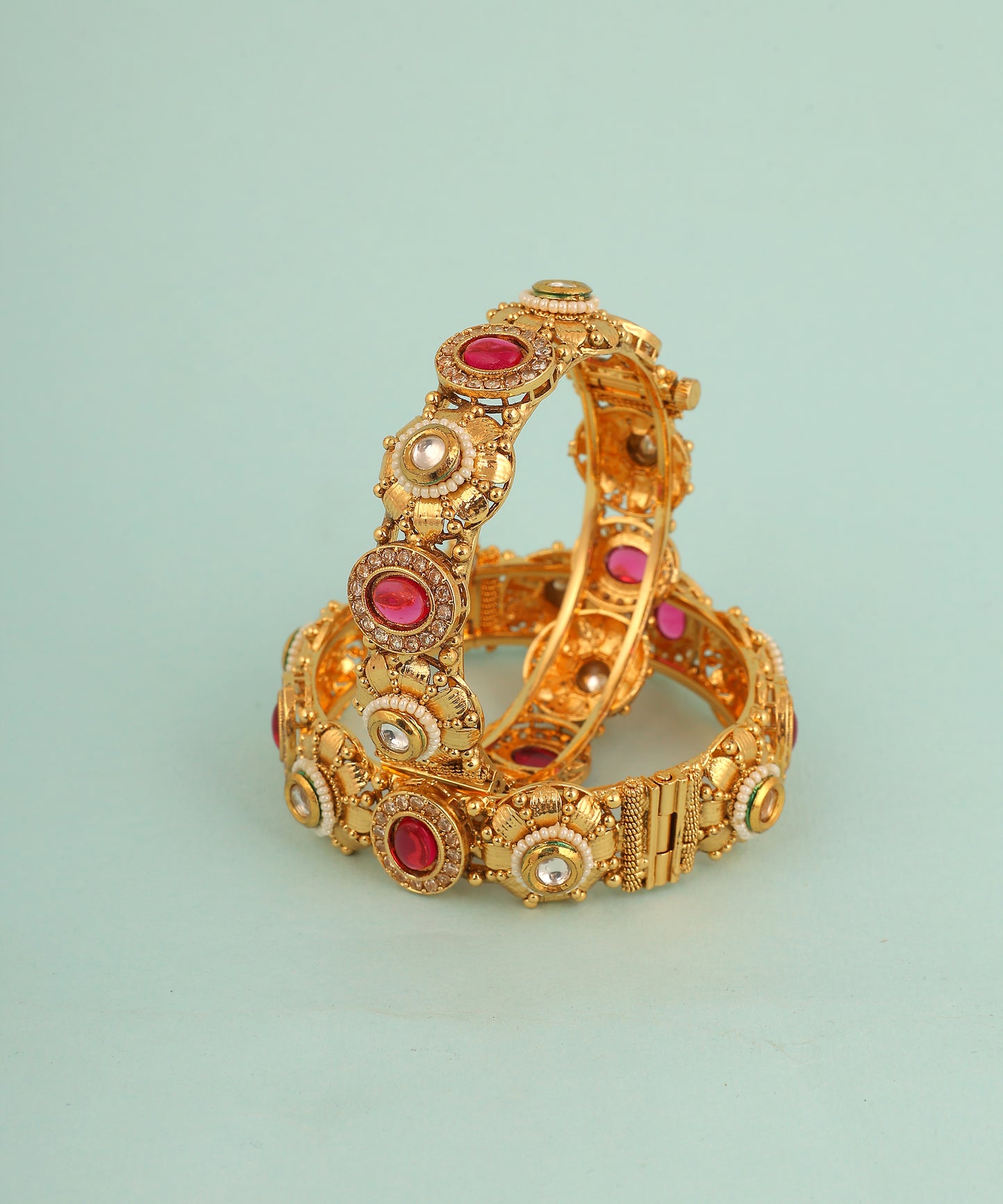 Pink Stone And Polki Studded Gold Toned Bangles
