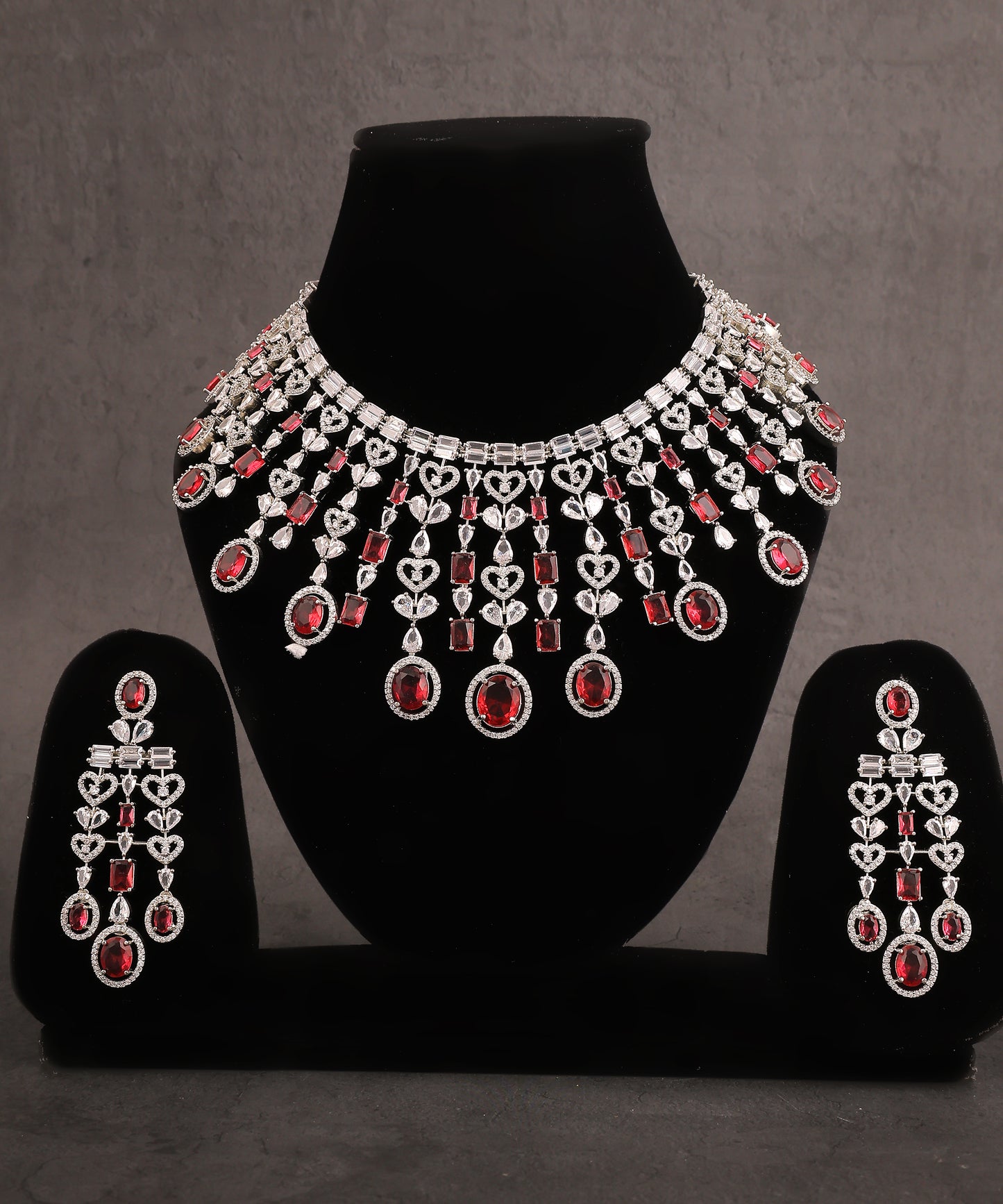 Estella Necklace Featuring Ruby Stones And Artificial Diamonds