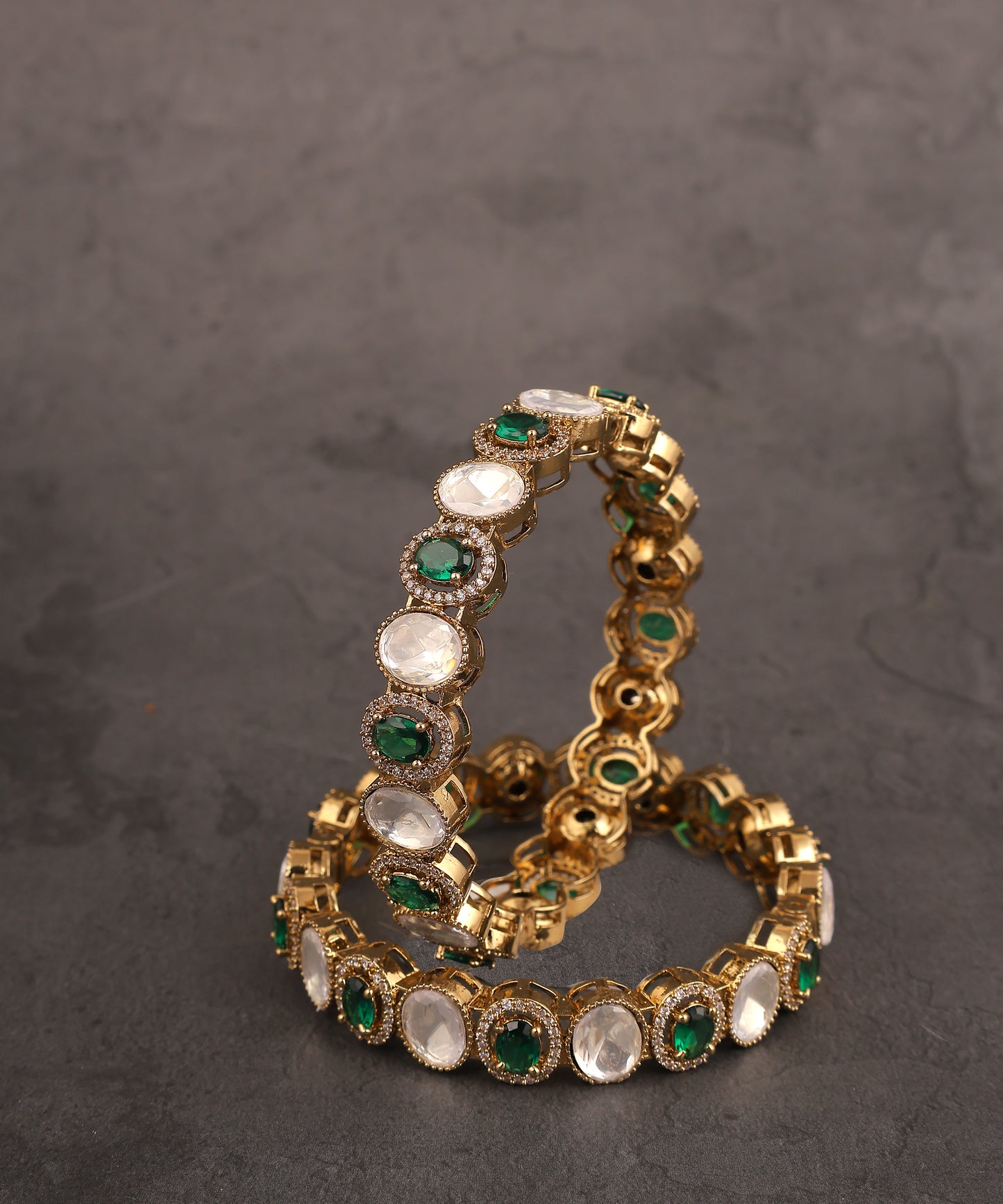 Polki And Emerald Stone Studded Bangles