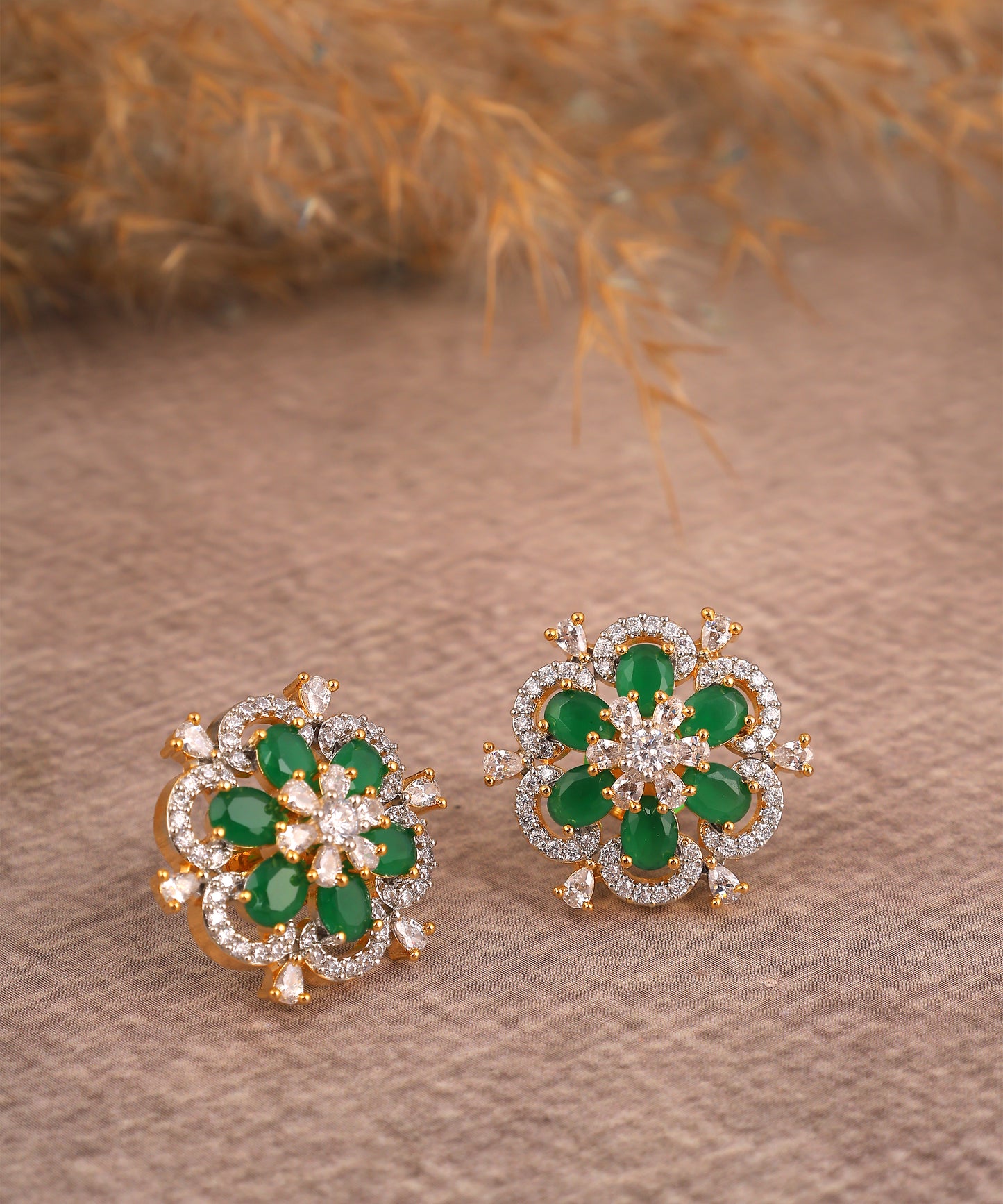 Floral Emerald And Crystal Studded Gold Toned Earrings