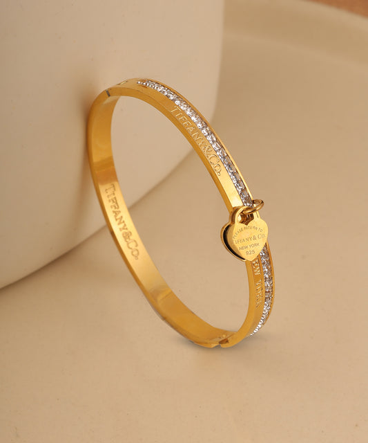 Gold Plated Heart Charm And Crystal Studded Bracelet