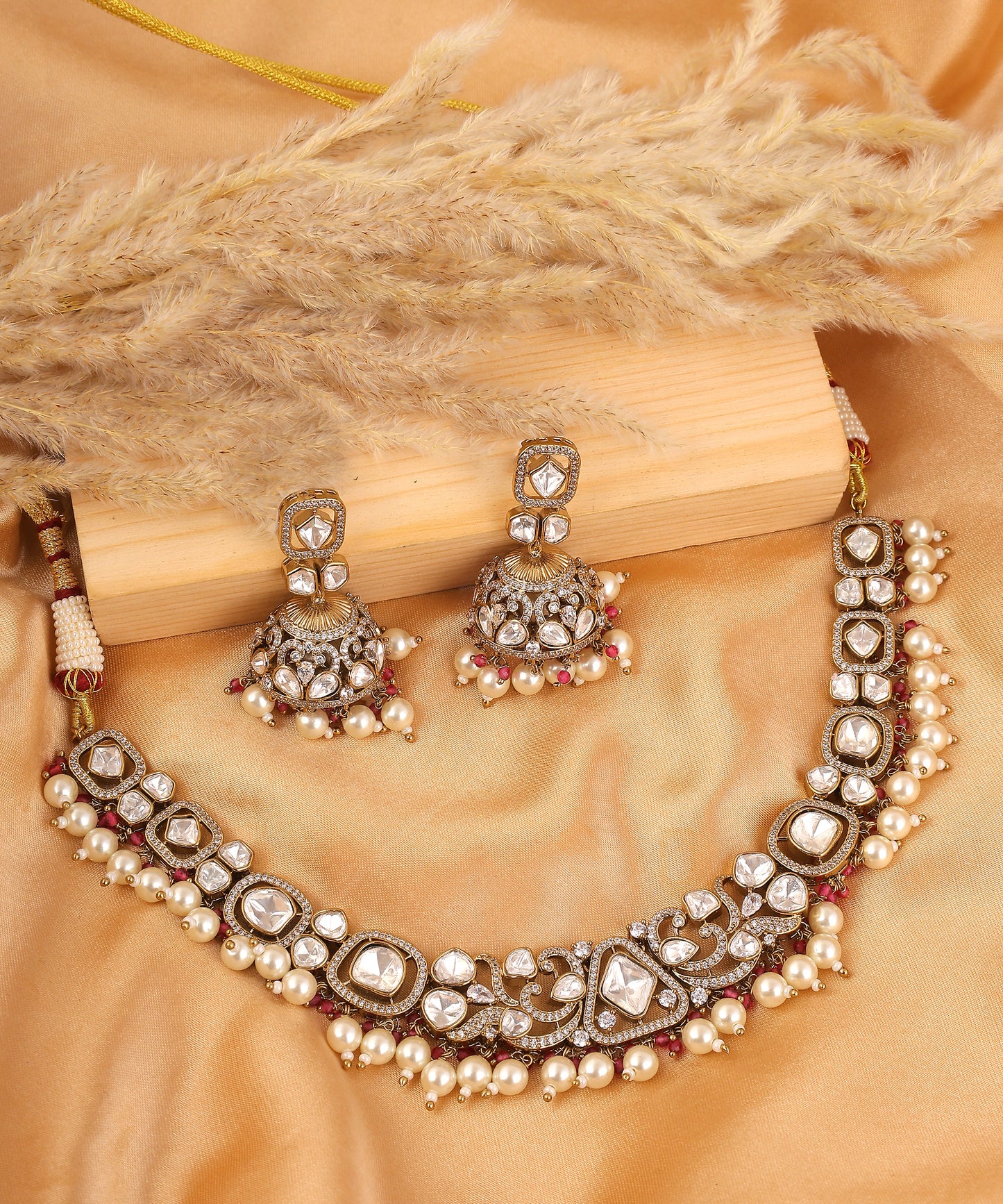 Rysa Necklace With Jhumkas Featuring Polkis, Pearl And Ruby Beads