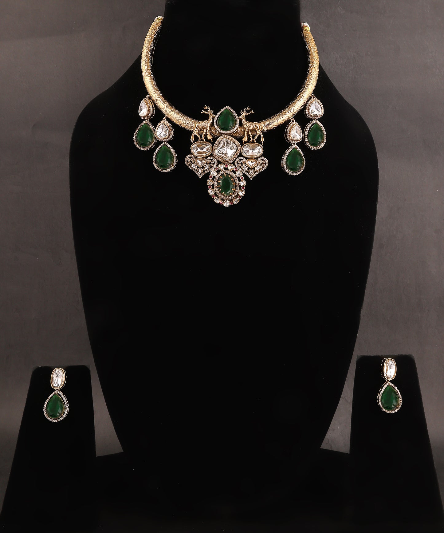 Maharaja hasli Featuring Emerald And Ruby Stone ,Polki And Deer Embellishments