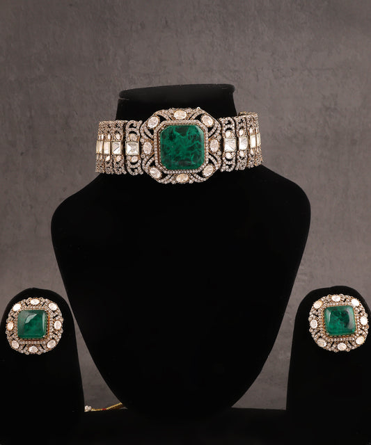 Adhrika Choker Featuring Equisite Polkis And emerald Doublet Stone