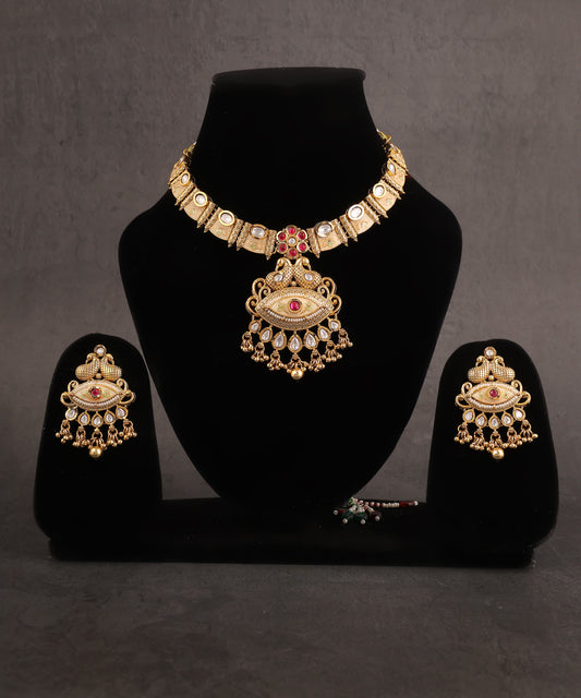 Vedhika Temple Necklace Set Featuring Polki And Pink Stones